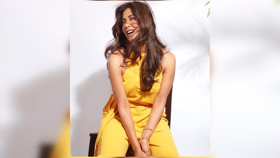 Chitrangda Singh keeps it comfy yet very trendy this summer in this vibrant yellow jumpsuit featuring a matching belt.(Instagram/@chitrangda)