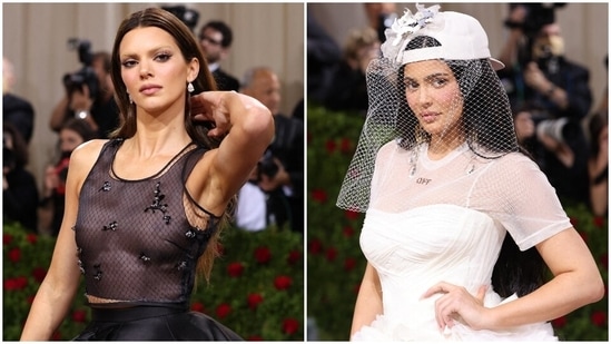 Kendall Jenner with bleached brows, Kylie in wedding dress with baseball cap have a Yin-Yang reunion at Met Gala 2022(Reuters)