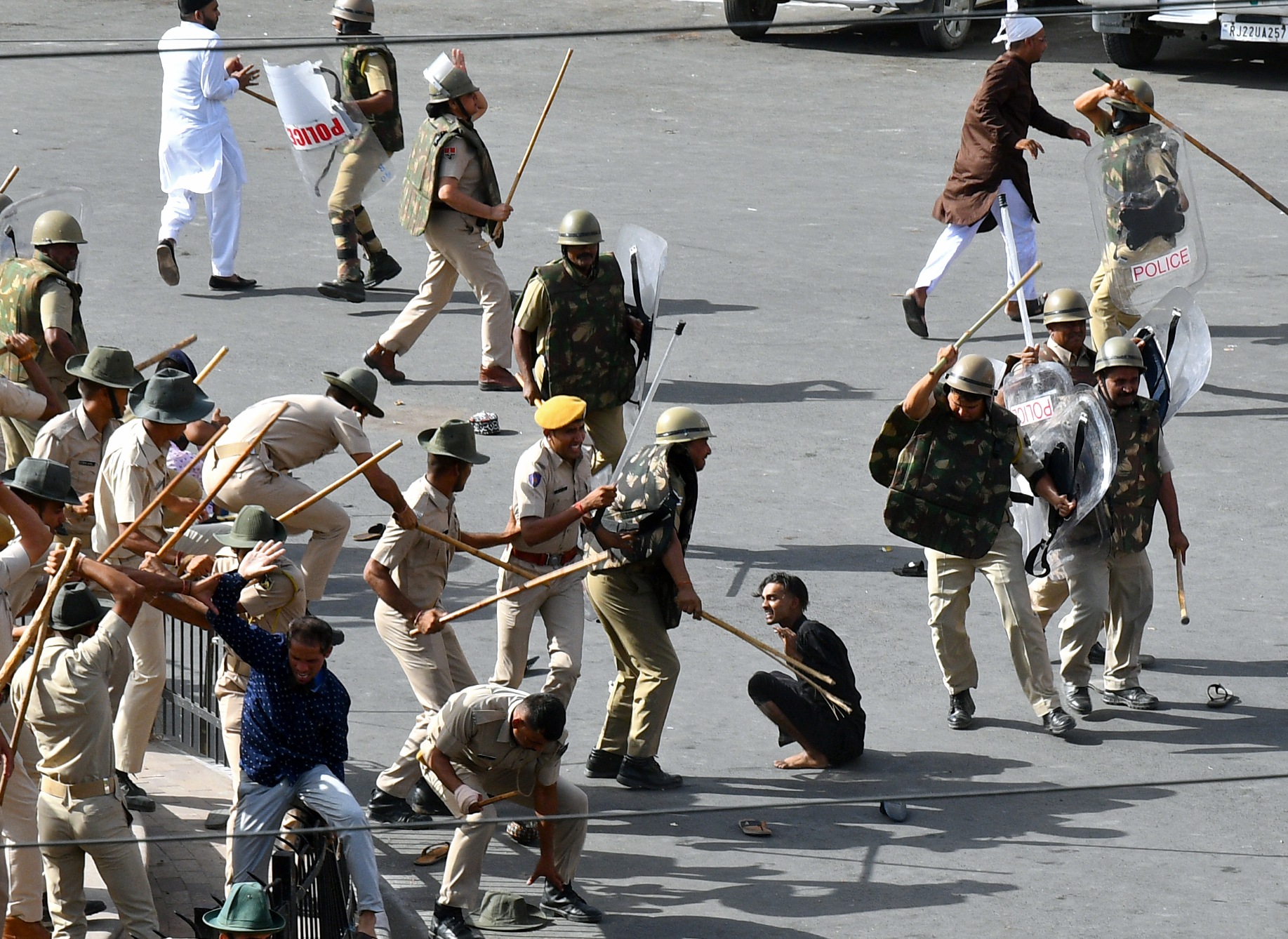 Police baton charge protesters after clashes broke out between two communities, in Jodhpur on Tuesday. (ANI) Police baton charge protesters after clashes broke out between two communities, in Jodhpur on Tuesday. (ANI)
