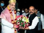 Union Home Minister Amit Shah being received by Karnataka Chief Minister Basavaraj Bommai at HAL airport, in Bengaluru on Tuesday. (ANI Photo) Union Home Minister Amit Shah being received by Karnataka Chief Minister Basavaraj Bommai at HAL airport, in Bengaluru on Tuesday. (ANI Photo)