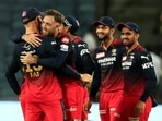 Pune: Glenn Maxwell of Royal Challengers Bangalore celebrates with teammates, the wicket of Robin Uthappa of Chennai Super Kings during the 49th T20 cricket match of the Indian Premier League 2022 (IPL season 15), between the Royal Challengers Bangalore and the Chennai Super Kings, at MCA International Stadium in Pune, Wednesday, May 4, 2022. (Sportzpics for IPL/PTI Photo)(PTI05_04_2022_000231B)(PTI)