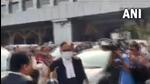 A group of lawyers affiliated to the Congress started shouting slogans at P Chidambaram when he was leaving the Calcutta high court premises on Wednesday. (Video grab/ANI)