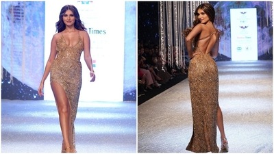 Tara Sutaria earlier walked the ramp in a dreamy embellished gold gown by Dolly J Studio. (Instagram/@tarasutaria)