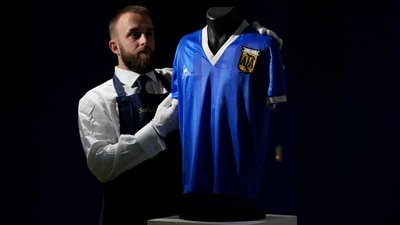 The shirt worn by Diego Maradona in the 1986 Mexico World Cup quarterfinal soccer match between Argentina and England, is displayed for photographs at Sotheby's auction house, in London (AP/File)