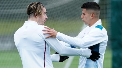 Manchester City's Jack Grealish, left and Joao Cancelo react during a training session at the City Football Academy, in Manchester, England, Tuesday May 3, 2022, ahead of their semi-final 2nd leg Champions League soccer match against Real Madrid on Wednesday. (AP) Manchester City's Jack Grealish, left and Joao Cancelo react during a training session at the City Football Academy, in Manchester, England, Tuesday May 3, 2022, ahead of their semi-final 2nd leg Champions League soccer match against Real Madrid on Wednesday. (AP)
