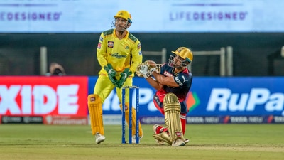 Pune: Mahipal Lomror of Royal Challengers Bangalore plays a shot during the 49th T20 cricket match of the Indian Premier League 2022 (IPL season 15), between the Royal Challengers Bangalore and the Chennai Super Kings, at MCA International Stadium in Pune, Wednesday, May 4, 2022. (Sportzpics for IPL/PTI Photo)(PTI05_04_2022_000206B) (PTI) Pune: Mahipal Lomror of Royal Challengers Bangalore plays a shot during the 49th T20 cricket match of the Indian Premier League 2022 (IPL season 15), between the Royal Challengers Bangalore and the Chennai Super Kings, at MCA International Stadium in Pune, Wednesday, May 4, 2022. (Sportzpics for IPL/PTI Photo)(PTI05_04_2022_000206B) (PTI)
