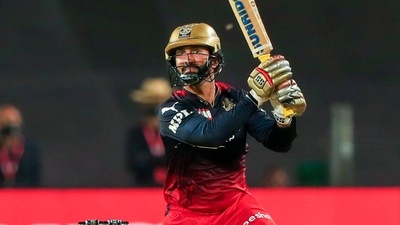 Pune: Dinesh Karthik of Royal Challengers Bangalore plays a shot during the 49th T20 cricket match of the Indian Premier League 2022 (IPL season 15), between the Royal Challengers Bangalore and the Chennai Super Kings, at MCA International Stadium in Pune, Wednesday, May 4, 2022. (Sportzpics for IPL/PTI Photo)(PTI05_04_2022_000221A) (PTI) Pune: Dinesh Karthik of Royal Challengers Bangalore plays a shot during the 49th T20 cricket match of the Indian Premier League 2022 (IPL season 15), between the Royal Challengers Bangalore and the Chennai Super Kings, at MCA International Stadium in Pune, Wednesday, May 4, 2022. (Sportzpics for IPL/PTI Photo)(PTI05_04_2022_000221A) (PTI)