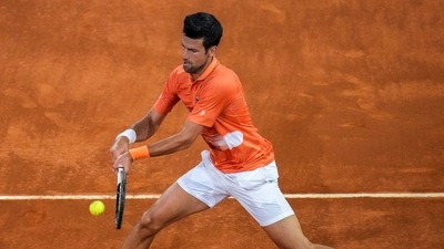 Serbia's Novak Djokovic returns the ball against Gael Monfils, of France, during their match at the Mutua Madrid Open tennis tournament in Madrid, Spain, Tuesday, May 3, 2022. (AP) Serbia's Novak Djokovic returns the ball against Gael Monfils, of France, during their match at the Mutua Madrid Open tennis tournament in Madrid, Spain, Tuesday, May 3, 2022. (AP)