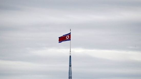 FILE PHOTO: A North Korean flag flutters on top of a 160-metre tower in North Korea's propaganda village of Gijungdong,(REUTERS)