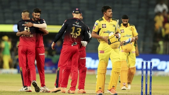 Pune: Royal Challengers Bangalore players greet each other celebrating their win against the Chennai Super Kings during the 49th T20 cricket match of the Indian Premier League 2022 (IPL season 15), at MCA International Stadium in Pune, Wednesday, May 4, 2022. (Sportzpics for IPL/PTI Photo)(PTI05_04_2022_000248B)(PTI)
