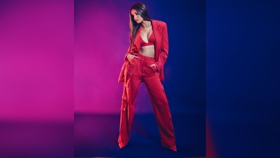 Tara Sutaria earlier made a stylish appearance while promoting her film Heropanti 2 in Ahmedabad wearing a red bralette, matching blazer and trousers set.(Instagram/@tarasutaria)