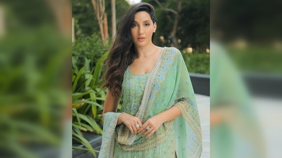 Nora Fatehi treated her fans with beautiful photos of herself in a pastel green salwar suit. The Moroccan beauty wished her fans and wrote, "Eid mubarak."(Instagram/@norafatehi)
