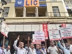 All India United Trade Union Centre activists shout slogans during their protest over the LIC's IPO in Kolkata, (PTI) All India United Trade Union Centre activists shout slogans during their protest over the LIC's IPO in Kolkata, (PTI)