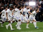 Champions League - Semi Final - Second Leg - Real Madrid v Manchester City - Real Madrid's Luka Modric, Karim Benzema and teammates celebrate after the match