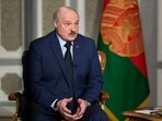 Belarus President Alexander Lukashenko speaks during an interview with The Associated Press at the Independence Palace in Minsk, Belarus, Thursday, May 5, 2022. (AP Photo/Markus Schreiber)