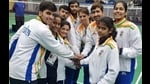 The Indian badminton team poses after winning gold in Brazil on Thursday. (HT Photo)