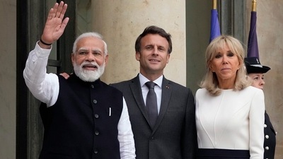 French President Emmanuel Macron and his wife Brigitte Macron welcome Indian Prime Minister Narendra Modi prior to a meeting at the Elysee palace in Paris. (AP) French President Emmanuel Macron and his wife Brigitte Macron welcome Indian Prime Minister Narendra Modi prior to a meeting at the Elysee palace in Paris. (AP)