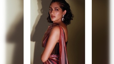 Kubbra Sait teamed her look with a see-through black sleeveless corset blouse and black stilettoes. (Instagram/@who_wore_what_when) Kubbra Sait teamed her look with a see-through black sleeveless corset blouse and black stilettoes. (Instagram/@who_wore_what_when)