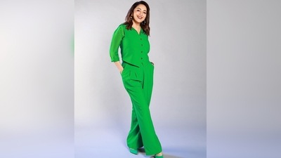 Madhuri Dixit's outfit comes with a full sleeves collared top, a waistcoat and loose fitted trousers. (Instagram/@madhuridixitnene) Madhuri Dixit's outfit comes with a full sleeves collared top, a waistcoat and loose fitted trousers. (Instagram/@madhuridixitnene)