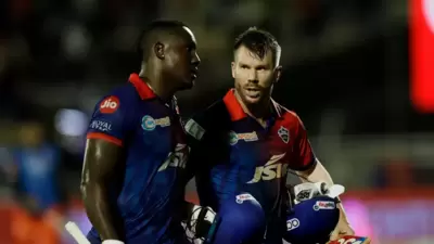 Rovman Powell (L) and David Warner (IPL) Rovman Powell (L) and David Warner (IPL)
