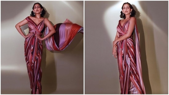 The bold and gorgeous Kubbra Sait has been in the limelight ever since she appeared in the Netflix series Sacred Game where she was seen playing the role of a transgender bar dancer, Kukoo. Her performance moved critics and the actor bagged several awards and nominations. She recently turned muse for ace designer Amit Agarwal in a saree inspired embellished dress(Instagram/@who_wore_what_when)