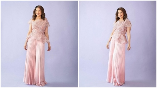 Madhuri Dixit is like a fairy in disguise who quietly casts a spell on her fans and leaves them mesmerised with her beauty and elegance. In these pictures, the Hum Aapke Hain Kaun actor can be seen posing in a mesh top and pleated pants set by designer Tanieya Khanuja.(Instagram/@madhuridixitnene)