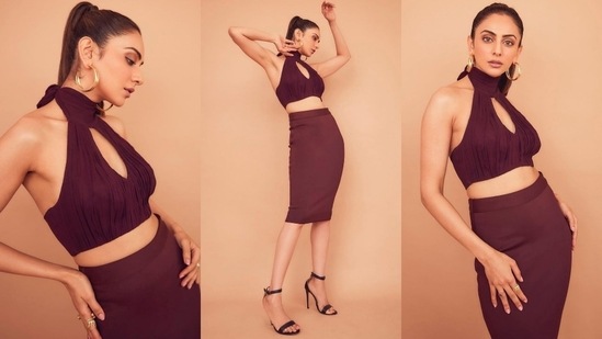 Ina another promotional look, Rakul Preet was seen striking some bold poses in a maroon co-ord set paired with black stilettoes.(Instagram/@rakulpreet)