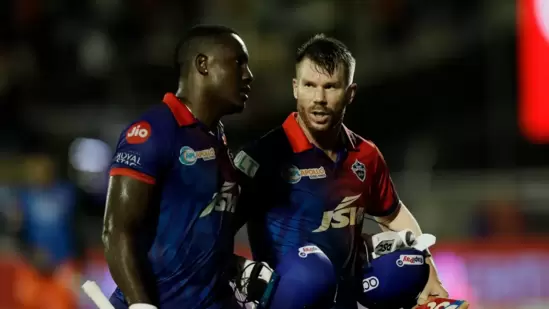 Rovman Powell (L) and David Warner (IPL)