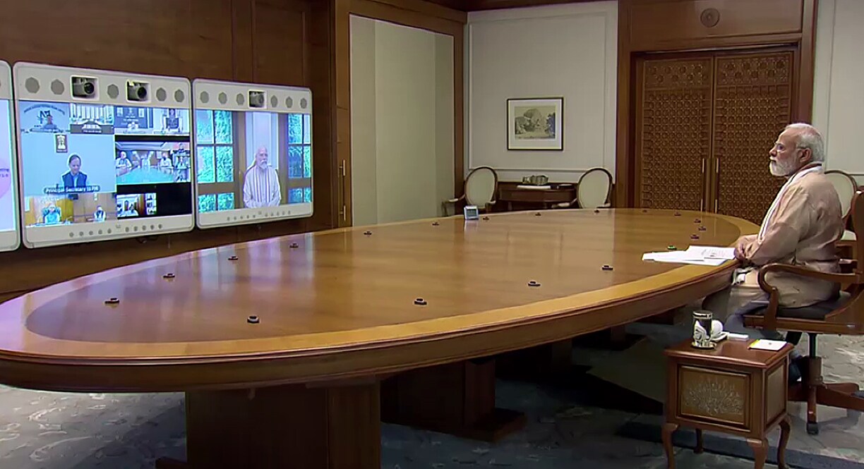 Prime Minister Narendra Modi chairs a meeting to review the preparations for the heatwave management and monsoon preparedness, in New Delhi on Thursday, May 5, 2022. (ANI Photo)