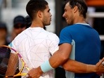 Spain's Carlos Alcaraz with Spain's Rafael Nadal