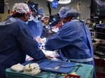 Surgeons performing a transplant of a heart from a genetically modified pig to patient David Bennett, Sr., in Baltimore, Maryland in January.(AFP)