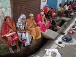 People wait in a queue to collect free ration from a government store in Prayagraj, If anything, the BJP has only expanded the realm of welfare benefits which now includes everything from toilets to tap water.(PTI) People wait in a queue to collect free ration from a government store in Prayagraj, If anything, the BJP has only expanded the realm of welfare benefits which now includes everything from toilets to tap water.(PTI)