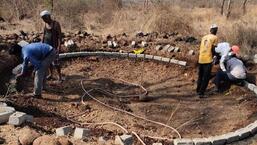 A waterhole dug up at Ambegaon tehsil in Pune district with money provided by a wildlife offender as per the court order. (HT PHOTO)