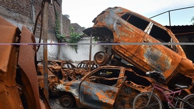 Damaged vehicles which were set fire during the Delhi riots seen dumped inside a parking lot six months after the North-East Delhi riots, at Shiv Vihar, in New Delhi Damaged vehicles which were set fire during the Delhi riots seen dumped inside a parking lot six months after the North-East Delhi riots, at Shiv Vihar, in New Delhi 