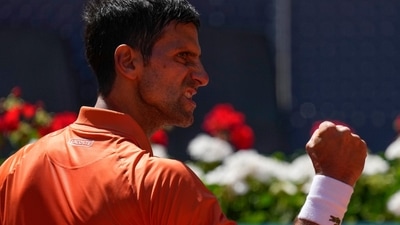 Serbia's Novak Djokovic celebrates after winning a match against Poland's Hubert Hurkacz (AP) Serbia's Novak Djokovic celebrates after winning a match against Poland's Hubert Hurkacz (AP)