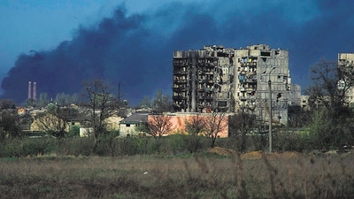 Ukraine war: Smoke rises from the grounds of the Azovstal steel plant in the city of Mariupol, Ukraine on Friday. (AFP)