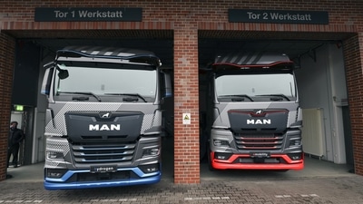 The MAN SE hydrogen concept truck, left, and E-truck prototype at the company's factory in Nuremberg, Germany, on Thursday, Feb. 17, 2022. MAN hope to accelerate the company's transformation towards emission-free freight with the presentation of their near-series electric and hydrogen truck prototypes at the company headquarters. Photographer: Alex Kraus/Bloomberg (Bloomberg) The MAN SE hydrogen concept truck, left, and E-truck prototype at the company's factory in Nuremberg, Germany, on Thursday, Feb. 17, 2022. MAN hope to accelerate the company's transformation towards emission-free freight with the presentation of their near-series electric and hydrogen truck prototypes at the company headquarters. Photographer: Alex Kraus/Bloomberg (Bloomberg)