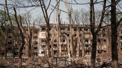 Trees and apartments are damaged by the impact of a missile explosion in Kramatorsk, eastern Ukraine. (AFP) Trees and apartments are damaged by the impact of a missile explosion in Kramatorsk, eastern Ukraine. (AFP)