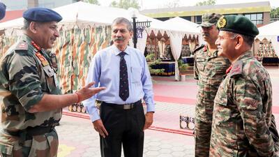 Northern Command chief Lt Gen Upendra Dwivedi arrives at Dhruva Auditorium in Jammu district on Friday. (PTI)