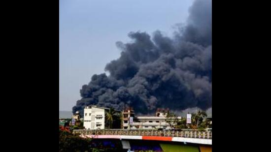 Navi Mumbai: Smoke billows from a fire in a chemical factory in Navi Mumbai on Friday, (PTI) Navi Mumbai: Smoke billows from a fire in a chemical factory in Navi Mumbai on Friday, (PTI)