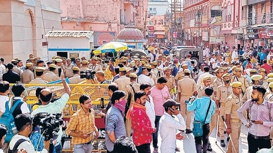 Police personnel deployed outside Gyanvapi Masjid in Varanasi on Friday. (ANI)