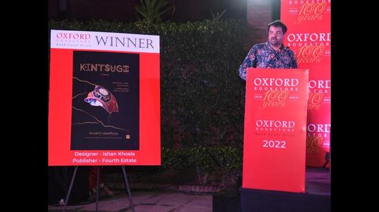 The designer with the winning cover (Courtesy Oxford Bookstore) The designer with the winning cover (Courtesy Oxford Bookstore)