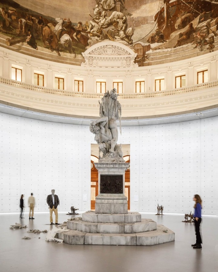 A 6-metre-high wax replica of a Renaissance-era sculpture slowly melts, in a comment on space and time, at Bourse de Commerce – Pinault Collection. (Florent Michel) A 6-metre-high wax replica of a Renaissance-era sculpture slowly melts, in a comment on space and time, at Bourse de Commerce – Pinault Collection. (Florent Michel)