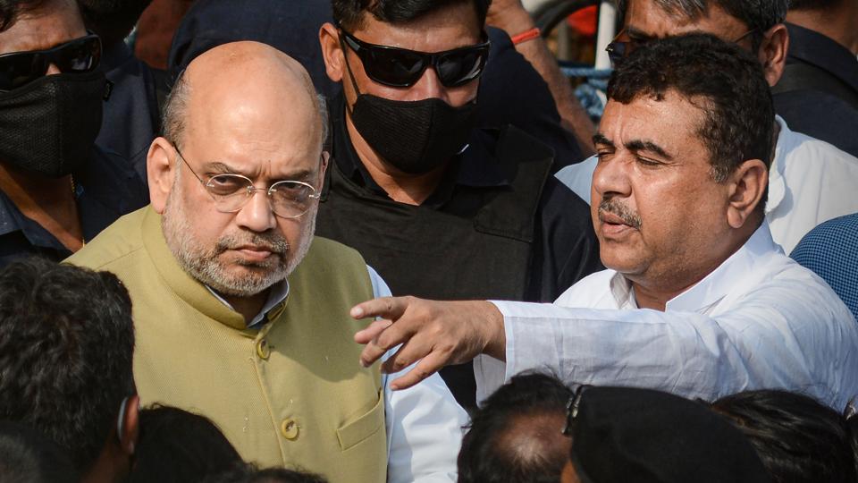 Union home minister Amit Shah and Bengal BJP leader Suvendu Adhikari leave after meeting Bharatiya Janata Yuva Morcha leader Arjun Chowrasia’s family members at Kashipur near Kolkata, on Friday (PTI) Union home minister Amit Shah and Bengal BJP leader Suvendu Adhikari leave after meeting Bharatiya Janata Yuva Morcha leader Arjun Chowrasia’s family members at Kashipur near Kolkata, on Friday (PTI)