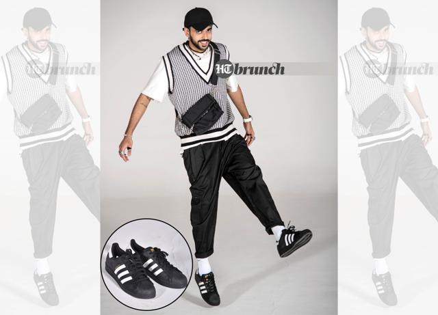 Solid black-and-white sneakers are classic and can be paired with anything; Tee, vest, bag and cap by Zara; Pants and shoes by Adidas Originals