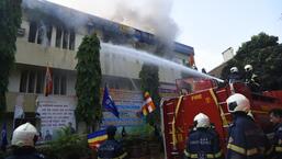 The flames originated on the second floor of the LIC building at SV Road in Mumbai's Ville Parle (West).  No injuries have been reported so far.  (HT Photo/Vijay Bate)