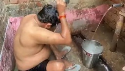 A screengrab of UP minister Nand Gopal Gupta ‘Nandi’ taking a bath. (Twitter/@NandiGuptaBJP)