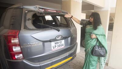 Vaishali Patkar, a resident of Bella Casa society shows damages to her car due to controlled blasting incident. (HT File Photo) Vaishali Patkar, a resident of Bella Casa society shows damages to her car due to controlled blasting incident. (HT File Photo)