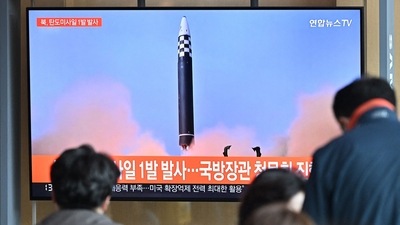 People watch a television screen showing a news broadcast with file footage of a North Korean missile test, at a railway station in Seoul. (AFP) People watch a television screen showing a news broadcast with file footage of a North Korean missile test, at a railway station in Seoul. (AFP)
