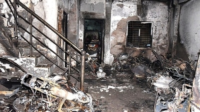 Charred remains are pictured after a massive fire broke out in a building, at Swarna Bagh Colony, in Indore on Saturday. (ANI) Charred remains are pictured after a massive fire broke out in a building, at Swarna Bagh Colony, in Indore on Saturday. (ANI)